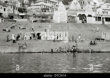 River Ganges Scindia Ghat in Varanasi Benares in Uttar Pradesh in India in South Asia. Life Lifestyle Hindu Religion Religious Temple People Travel Stock Photo