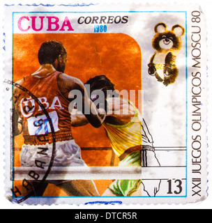 stamp printed in CUBA, devoted Olympic Games in Moscow (1980) and shows Boxing, two boxers in ring, circa 1980 Stock Photo