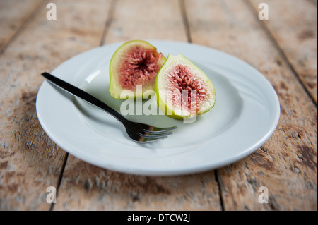Ripe Figs on plate. Stock Photo