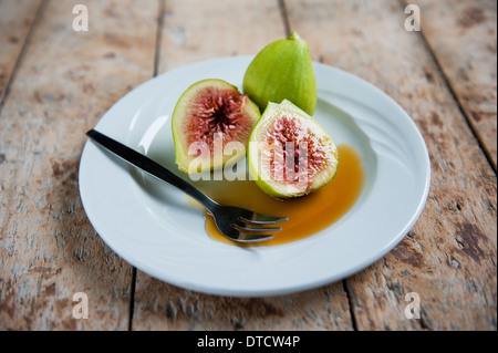 Ripe Figs on plate. Stock Photo