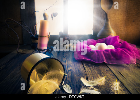 Vintage easter decoration with eggs and candle Stock Photo