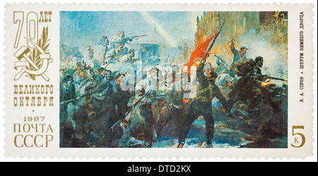 stamp printed in Soviet Union shows the 'Assault of winter palace', by V.A. Serov Stock Photo