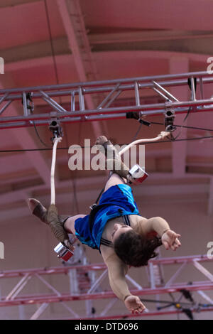 Blackpool, Lancashire, UK 15th February, 2014.  Kaely Michels-Gualtieri trapeze acrobat from the NoFit State Circus, a contemporary circus company based in Cardiff, Wales. A troupe at Blackpool's annual festival of circus, magic & new variety. The ten-day festival of magic that is Showzam sees Blackpool’s famous landmarks overrun with tightrope walkers, tightrope walkers, acrobatics, and performers high above the ground on trapezes. Stock Photo