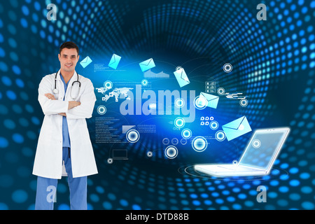 Composite image of doctor standing up with arms crossed Stock Photo