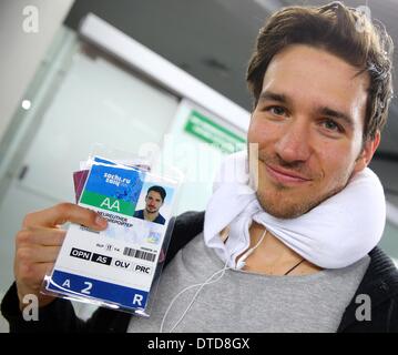 Sochi, Russia. 15th Feb, 2014. Alpine skier Felix Neureuther of Germany shows his Olympic accreditation during his arrival at the airport Adler during the Sochi 2014 Olympic Games, in Sochi, Russia, 15 February 2014. Photo: Michael Kappeler/dpa/Alamy Live News