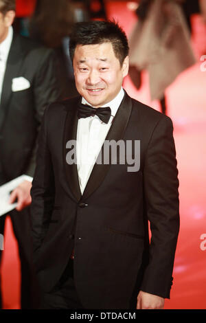 Berlin, Germany. 15th Feb, 2014. Actor Wang Jingchun arrives on the red carpet for the closing ceremony of the 64th Berlinale International Film Festival in Berlin, Germany, on Feb. 15, 2014. Credit:  Zhang Fan/Xinhua/Alamy Live News Stock Photo