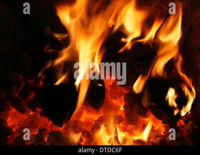 Solid Fuel, domestic coal Fire, burning, flame, flames, hearth, fireside, hea,t energy, power, fires, warmth, warm, home, fires Stock Photo