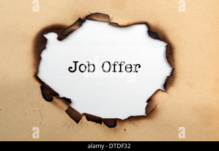 Job offer text in paper hole Stock Photo