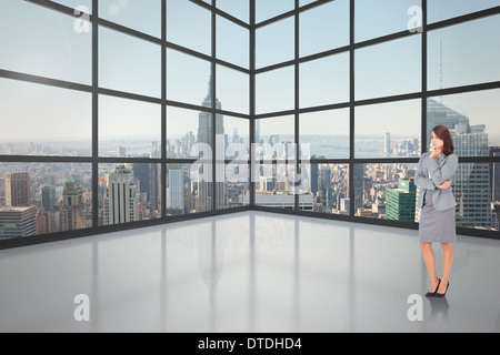 Composite image of focused businesswoman Stock Photo