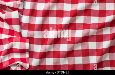 red crumpled checkered picnic tablecloth Stock Photo