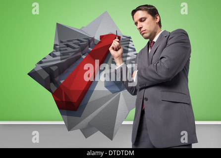 Composite image of thoughtful businessman holding pen Stock Photo