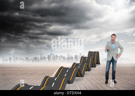 Composite image of stylish man smiling and gesturing Stock Photo