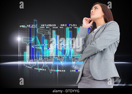 Composite image of focused businesswoman Stock Photo