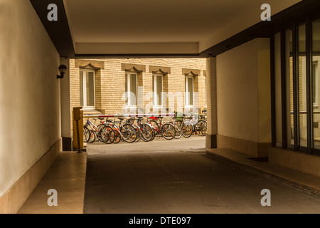Bicycles in a backyard of a residential building in Berlín Stock Photo