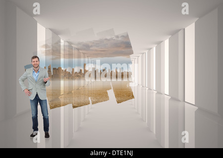 Composite image of stylish man smiling and gesturing Stock Photo