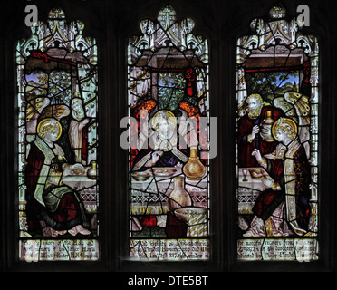 Stained glass window by the Kempe Studios, depicting Abraham entertaining the angels, St Mary the Virgin, Cannington, Somerset England Stock Photo