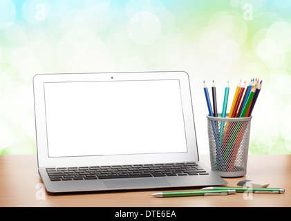 Education or back to school Concept. glasses, pencils, note books, chalk,  eraser over chalkboard background. Stock Photo