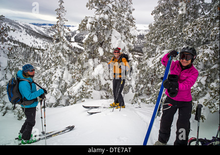 Back country skiers preparing for a downhill run near Monarch Pass, central Colorado, USA Stock Photo