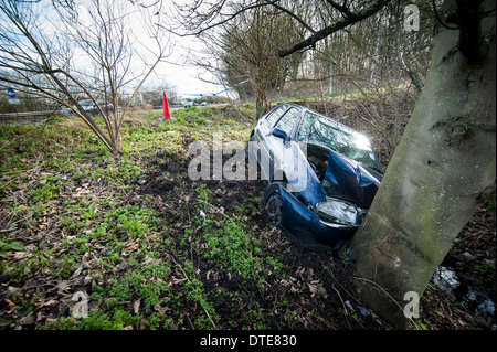 Crashed car just off the A34, at the turn off to Wytham. 8th Feb 2014 Stock Photo