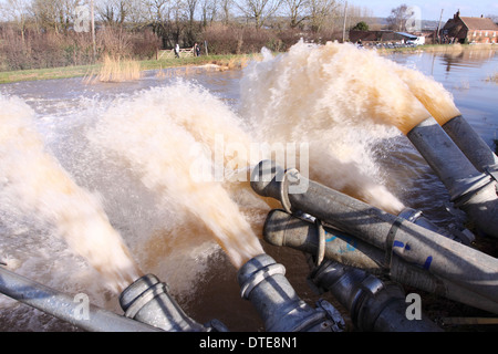 Somerset Levels giant water pipes pumping flood water from the Moorland and Saltmoor area into the River Parrett Stock Photo