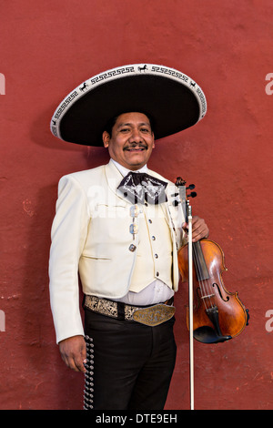 Nov. 5, 2013 - Oaxaca, Mexico - Cowboy belt buckle and sombrero of a Mexican  mariachi dressed in tra