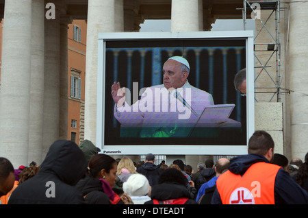 The Pope appears on the telly viewer to the crowds in Rome.This is directly outside               St.Peter's church inthe square Stock Photo