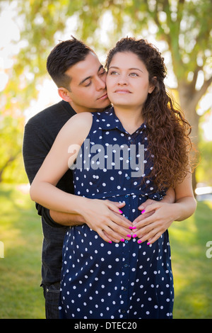 Young pregnant hispanic woman with her husband Stock Photo - Alamy
