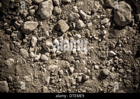 Dry soil and stones of an agricultural field Stock Photo