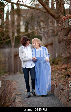Mature woman with senior mother Stock Photo