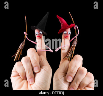 Caricature made of a finger puppet representing two funny halloween witches Stock Photo