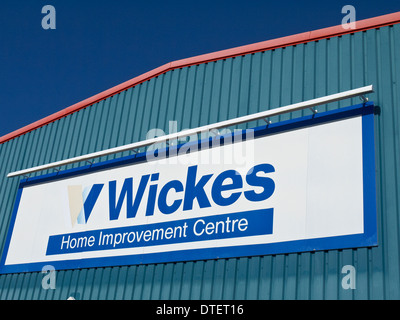 Wickes Home Improvement Centre sign on DIY store UK Stock Photo