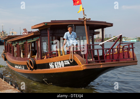 Boat on Saigon river, Ho Chi Minh City, Vietnam Stock Photo