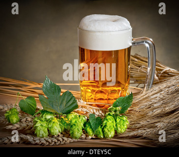 still life with beer glass and hops Stock Photo