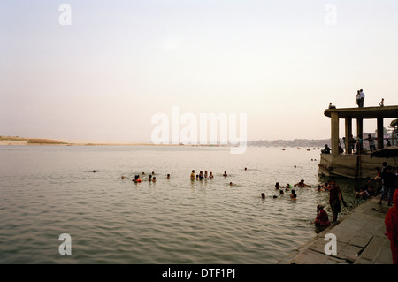 Life on the ghats of the River Ganges in Varanasi Benares in Uttar Pradesh in India in South Asia. Lifestyle Serenity Swim Swimming Wanderlust Travel Stock Photo