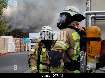Berlin, Germany, Feuerwehrmaenner with respiratory protective equipment Stock Photo