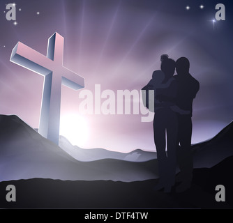 A loving Christian family with a cross in a mountain landscape with sunrise over mountains, Christian lifestyle or Easter concep Stock Photo