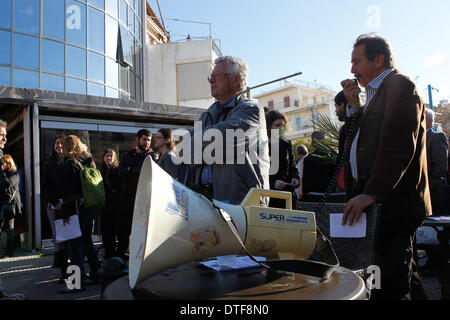 Athens, Greece. 17th Feb, 2014. Doctors, who have been on strike for more than two months, protested outside EOPYY(National Organisation for Healthcare Provision) offices in Athens against the government decision to close EOPYY clinics for a month pending the launch of a new primary healthcare system. The reforms are part of cost-cutting and efficiency-boosting measures Greece is implementing in exchange for the international rescue loans that have kept the country afloat since 2010. Credit:  Aristidis Vafeiadakis/ZUMAPRESS.com/Alamy Live News Stock Photo