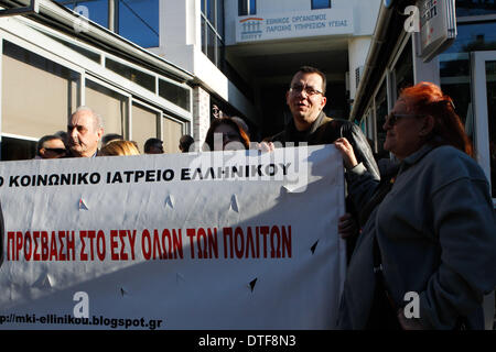 Athens, Greece. 17th Feb, 2014. Doctors, who have been on strike for more than two months, protested outside EOPYY(National Organisation for Healthcare Provision) offices in Athens against the government decision to close EOPYY clinics for a month pending the launch of a new primary healthcare system. The reforms are part of cost-cutting and efficiency-boosting measures Greece is implementing in exchange for the international rescue loans that have kept the country afloat since 2010. Credit:  Aristidis Vafeiadakis/ZUMAPRESS.com/Alamy Live News Stock Photo