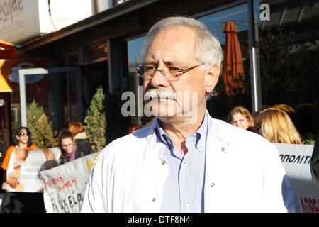 Athens, Greece. 17th Feb, 2014. Doctors, who have been on strike for more than two months, protested outside EOPYY(National Organisation for Healthcare Provision) offices in Athens against the government decision to close EOPYY clinics for a month pending the launch of a new primary healthcare system. The reforms are part of cost-cutting and efficiency-boosting measures Greece is implementing in exchange for the international rescue loans that have kept the country afloat since 2010. Credit:  Aristidis Vafeiadakis/ZUMAPRESS.com/Alamy Live News Stock Photo