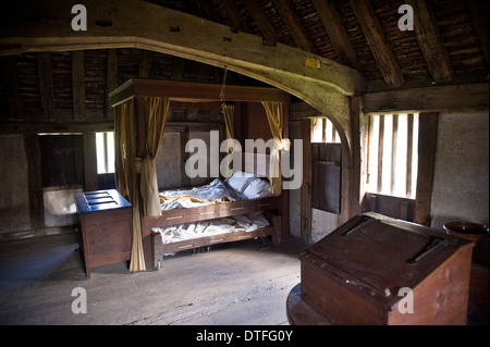Tudor bedroom in Bayleaf at the Weald & Downland Open Air Museum at Singleton, near Chichester, West Sussex, UK Stock Photo