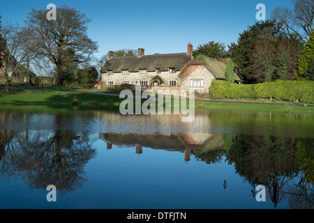 Ashmore in Dorset and its distinctive village pond. Stock Photo