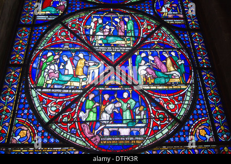 Stained glass window inside Canterbury Cathedral in Kent Stock Photo