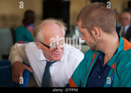 Kinshasa, DRC. 17th Feb 2014. Joshua French in conversation with Norwegian special envoy Kai Eide at the start of todays trial in Kinshasa, DRC Credit:  Rey T. Byhre/Alamy Live News Stock Photo