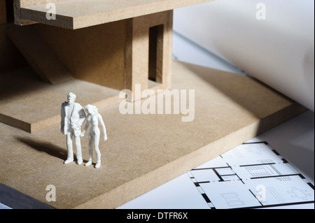 Photo of an architectural model with various model figures Stock Photo