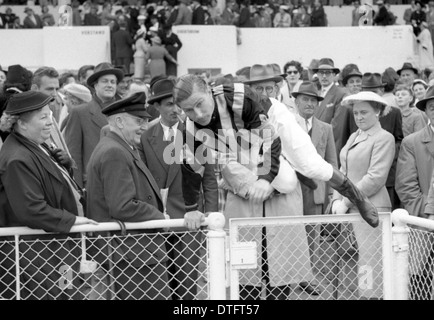 Hamburg, Germany, Jockey jumps over a fence Hein Bollow Stock Photo