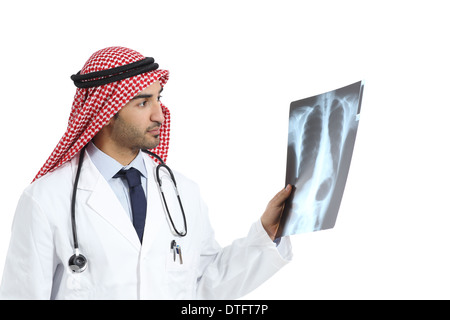 Arab saudi emirates doctor man looking a radiography diagnosing isolated on a white background Stock Photo