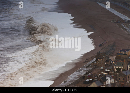 Giant waves on Chesil Beach Portland Dorset from 15/2/14 storm Stock Photo