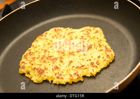potato fritter in a pan Stock Photo