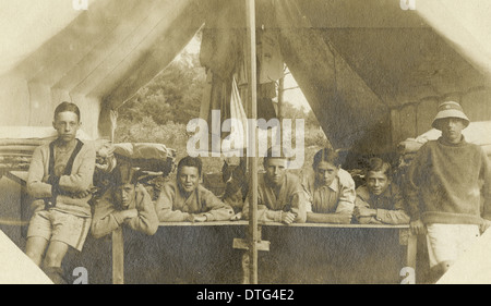 1910 photograph of Camp Kineo campers in their army style tent with cots. Stock Photo