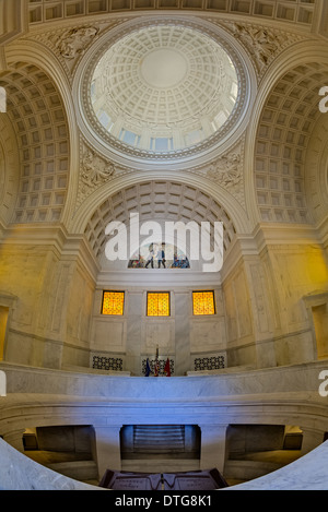 A view to General Ulysses S. Grant and his wife Julia's red granite coffins in an open crypt in the bottom floor inside the memorial. We also see the rotunda that tops the circular gallery inside the memorial. Stock Photo